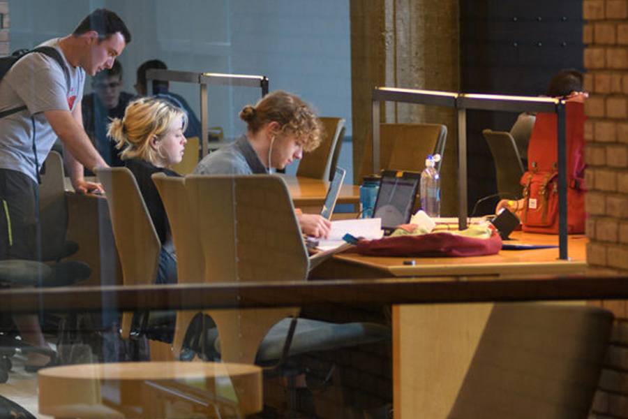 students in library