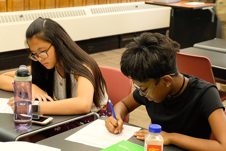 kids writing into tablets