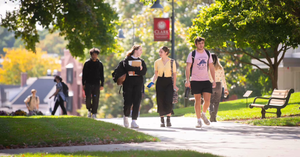 students walk across campus