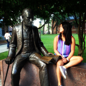 Juliane Murphy '17, M.S. '18, sitting with Sigmund (August 2013)