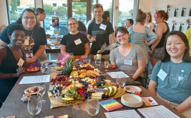 Guests, including Rigoria E. Tejada, Associate Director of Alumni & Friends Engagement (back left), and Emilee Cocuzzo '18, MBA '19, GOLD Council Co-Chair (bottom right)