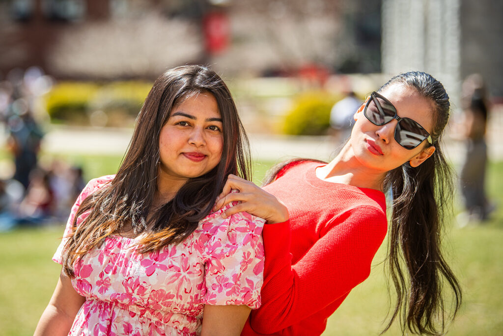 girls posing for camera