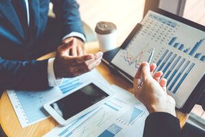Corporate Finance - Business Consulting meeting working and brainstorming new business project finance investment concept.