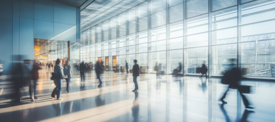 Time lapse of business people walking through airport