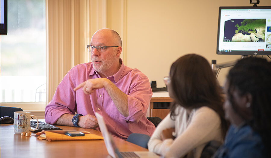 Ken MacLean talking to students