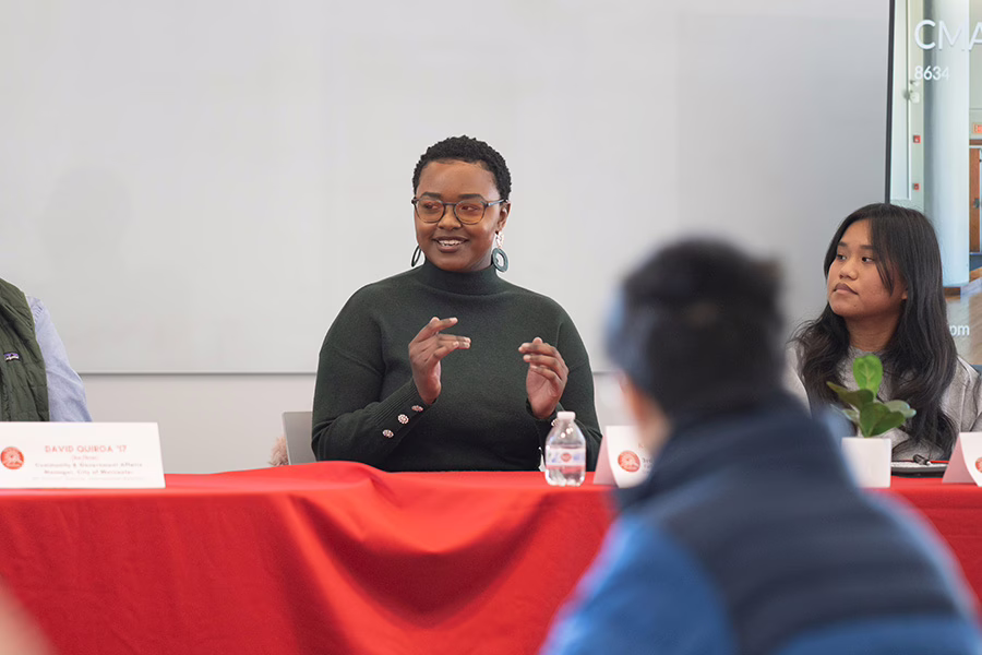 female speaking in front of students