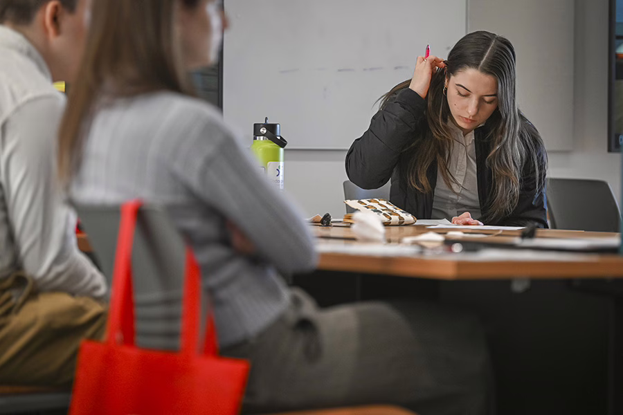 female student writting application