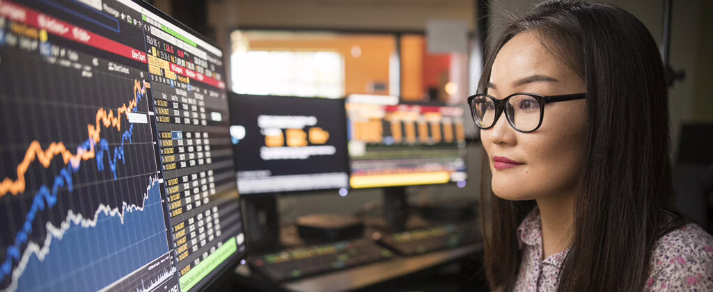 a student analyzes data at the computer