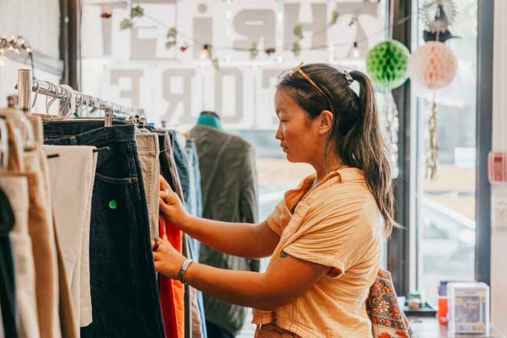 a student shops in the Clark Thrift store