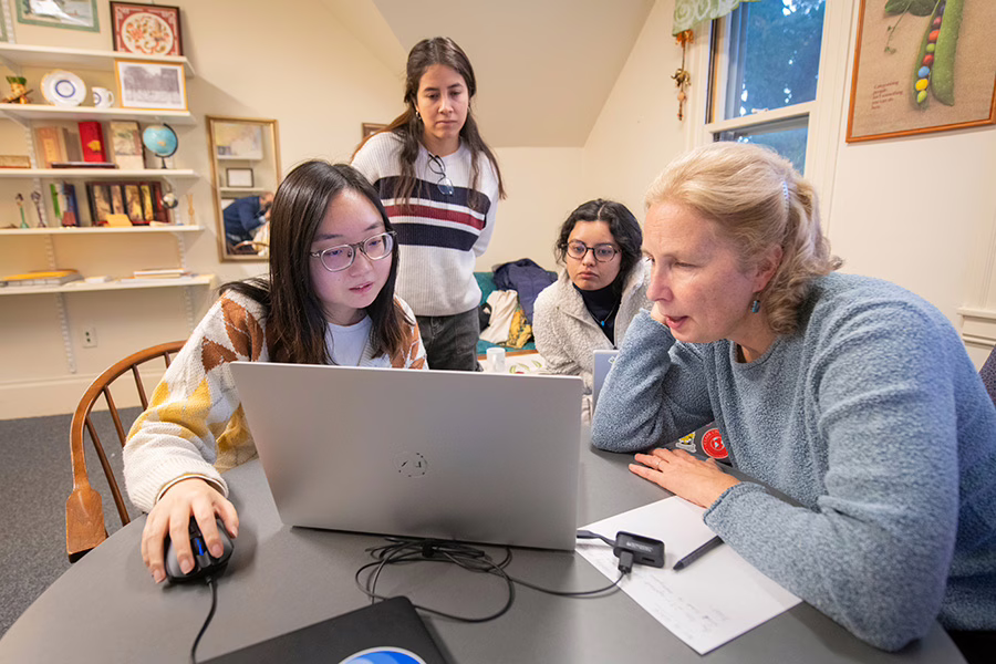 professor with students during office hours