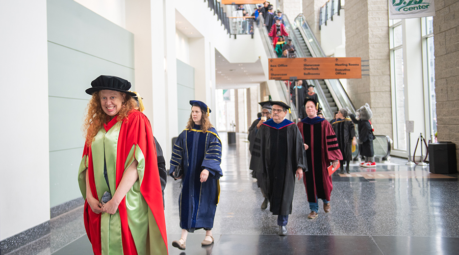 faculty members coming down escalator in DCU