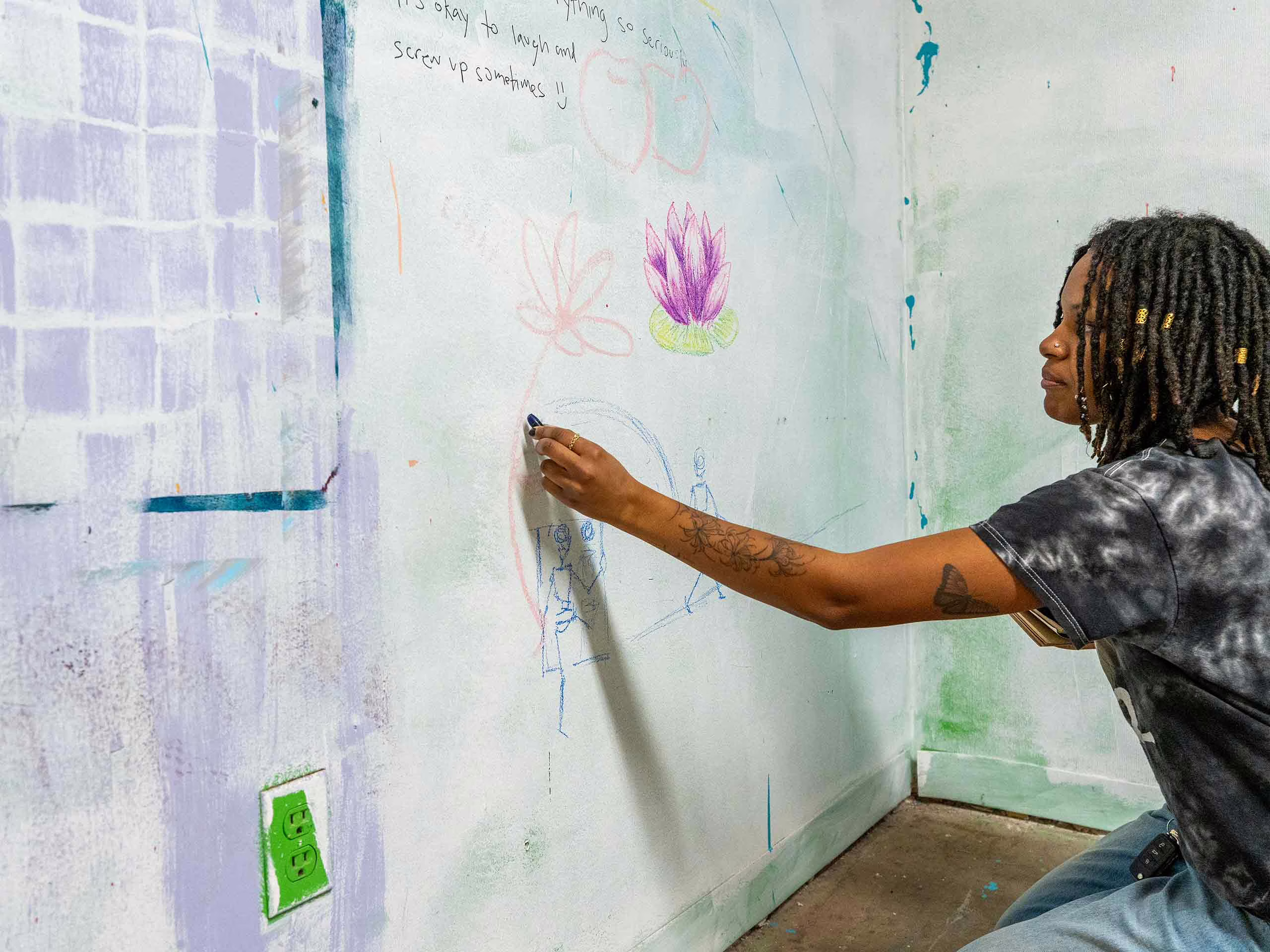 Skye Donaldson ’26 MAT ’27 painting a mural