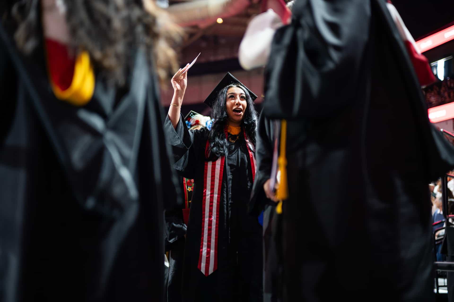 students cheer at Commencement