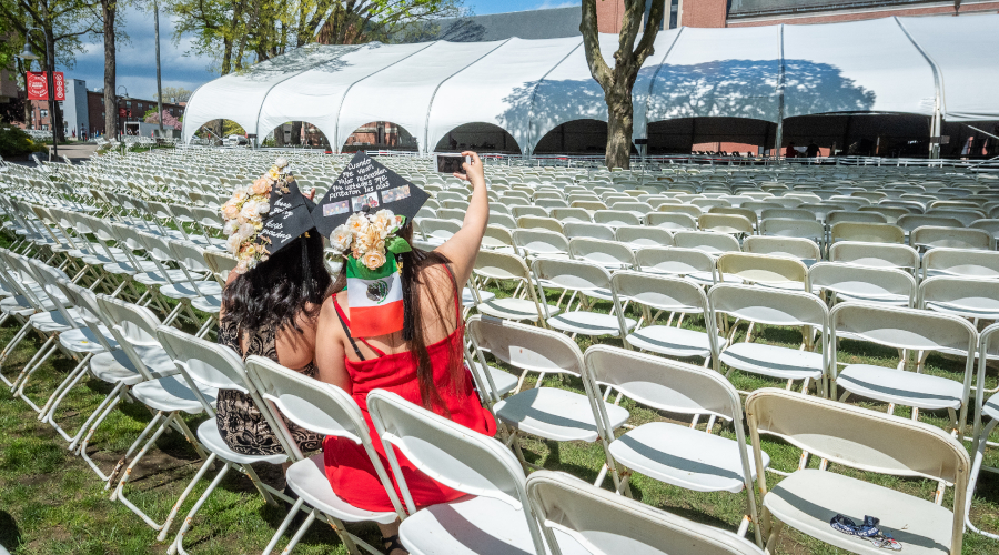 Students taking selfie before commencement