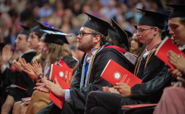 Students sitting at DCU Center