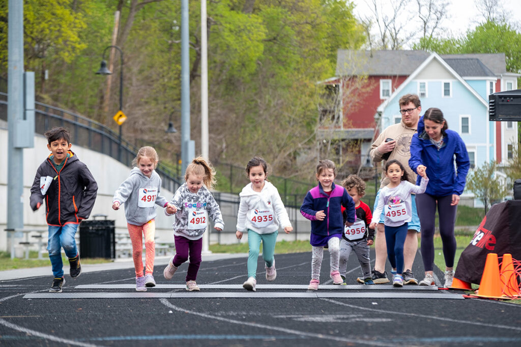 children running on clark field