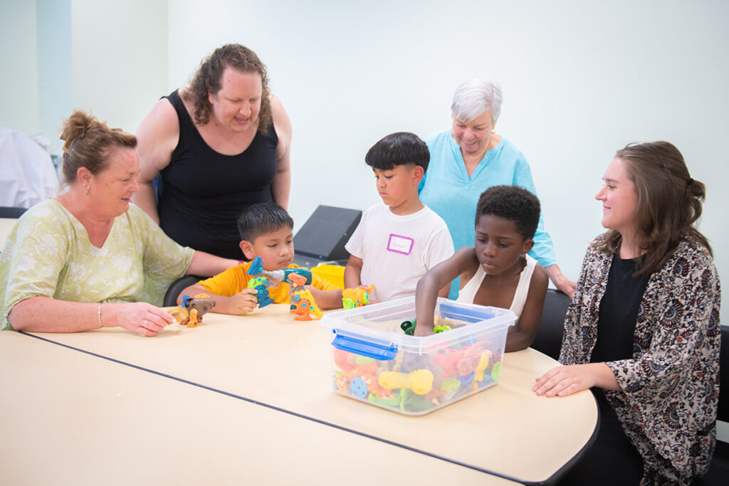 teachers with local students