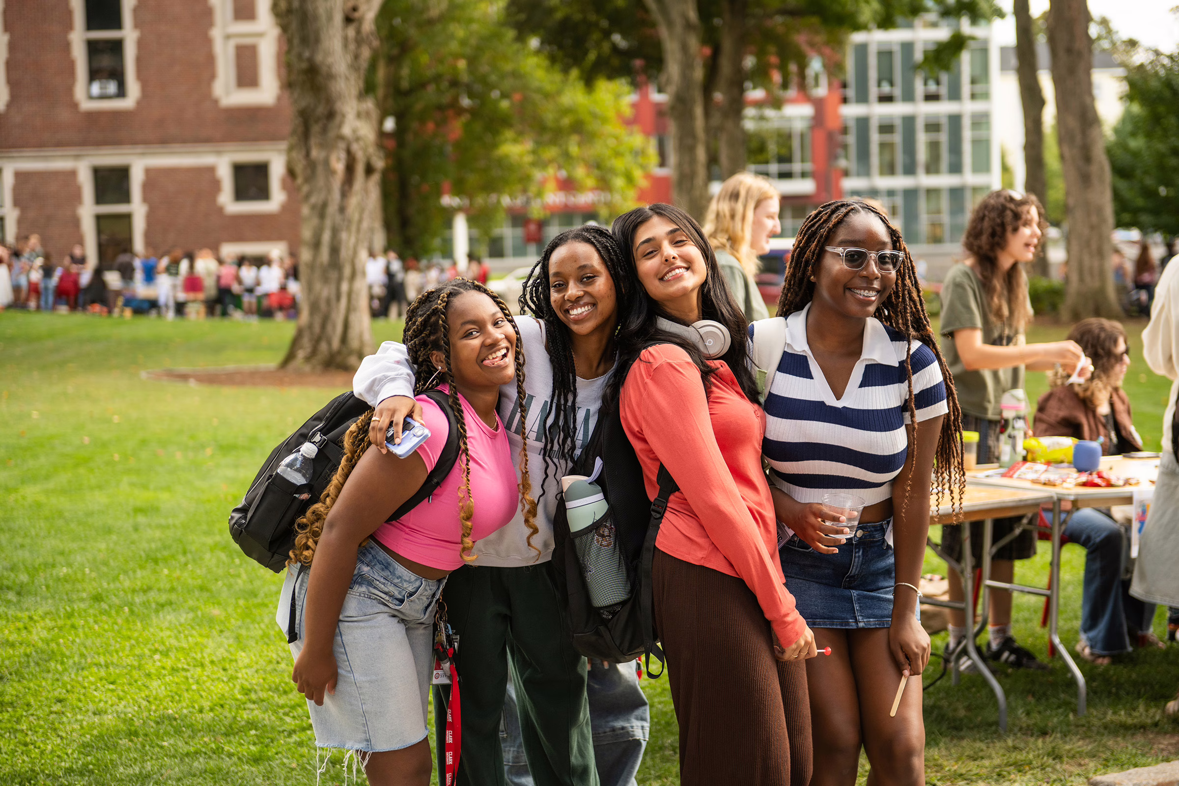 group of girls smiling and making funny faces