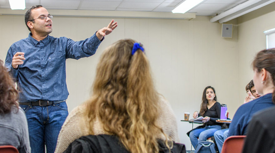 spanish professor with students in class