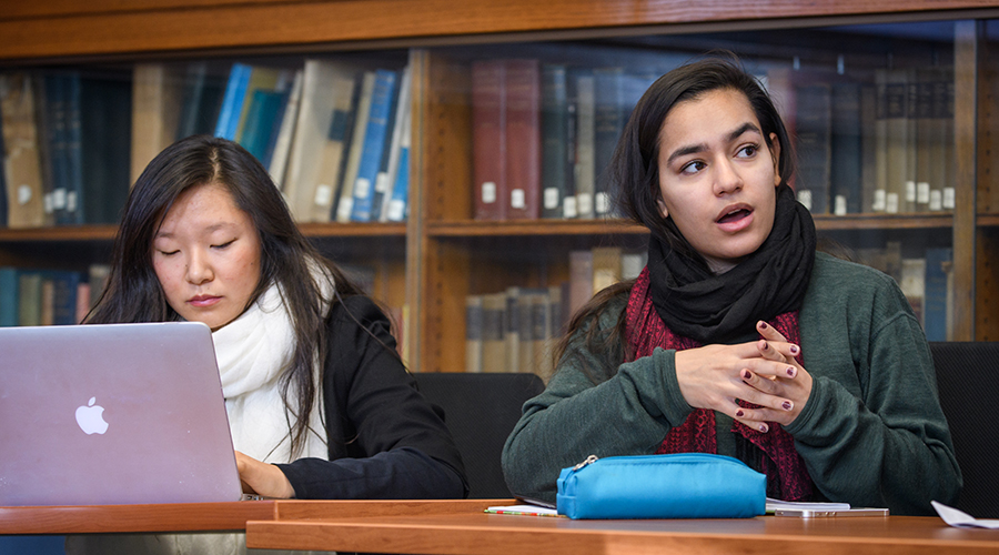 combined language major class with two students in discussions