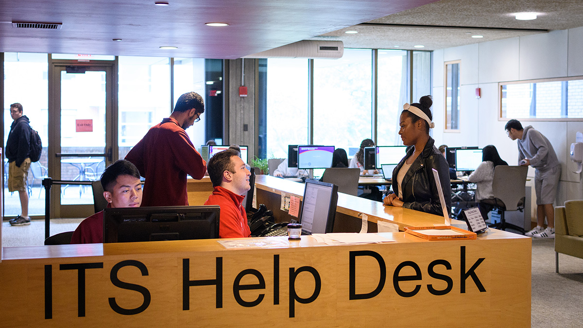 Students working at ITS help desk