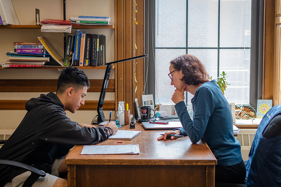 Professor Magda Tsaneva helping student during office hours