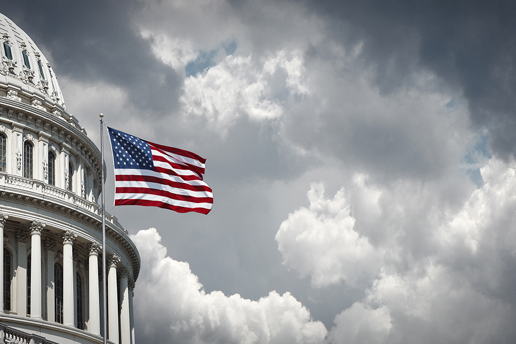 American flag flying outside U.S. Capitol dome