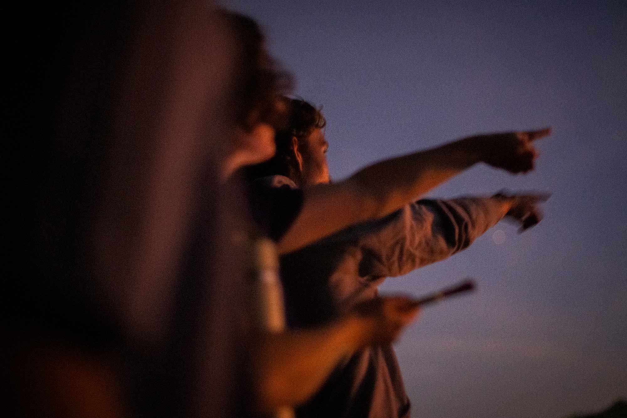 Students pointing at the sky, Coes Pond, Worcester