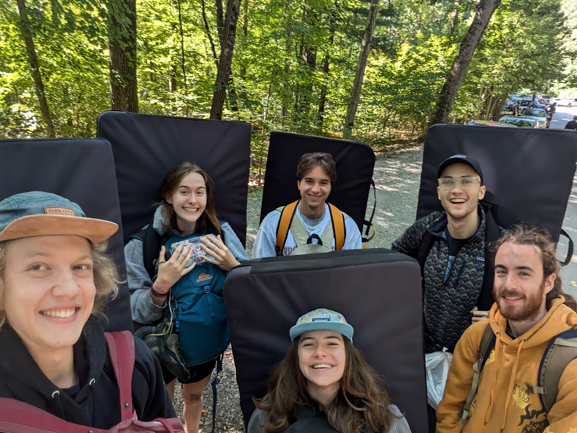 Devon Rose Leaver gathered with a group of fellow climbers at a trail head