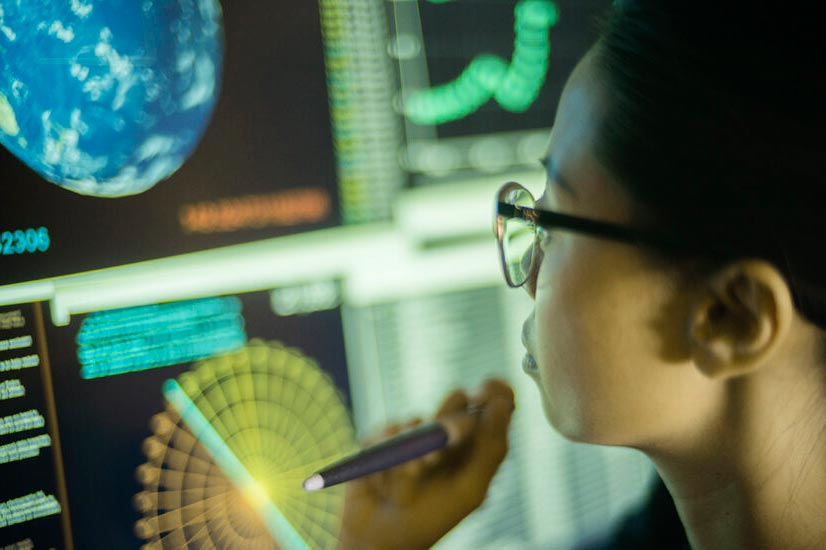 A person examining screens showing the discipline of data science