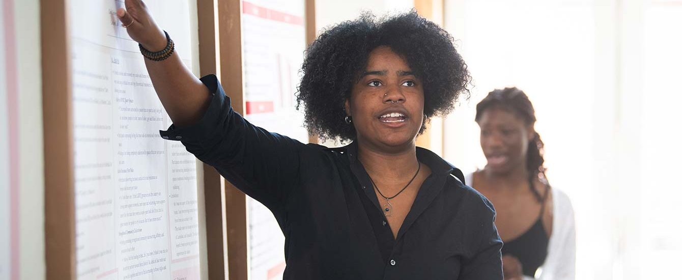 A student presenting their research