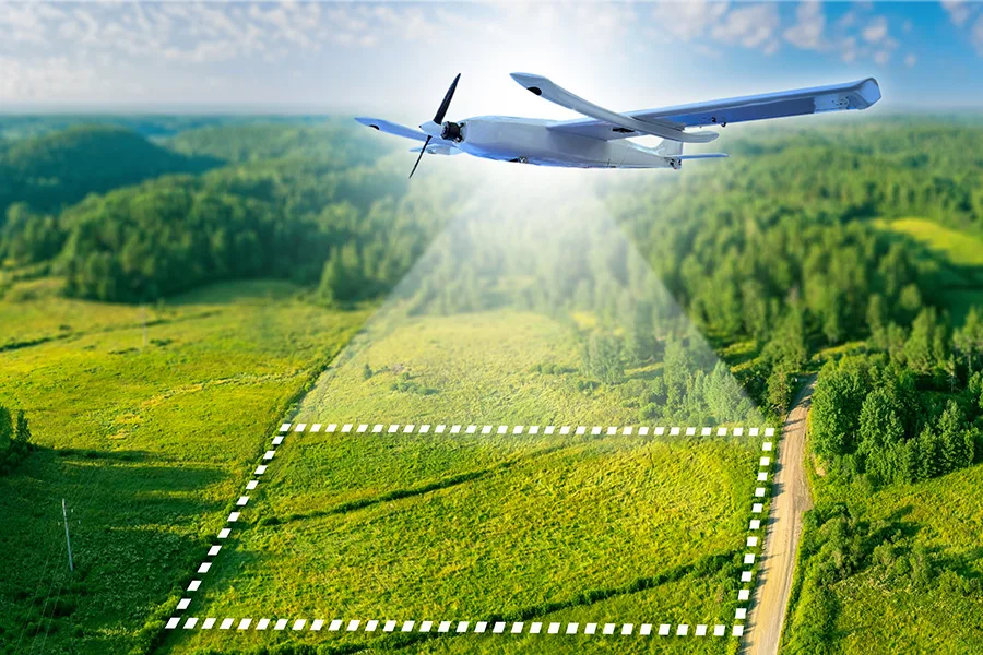 drone hovering over land