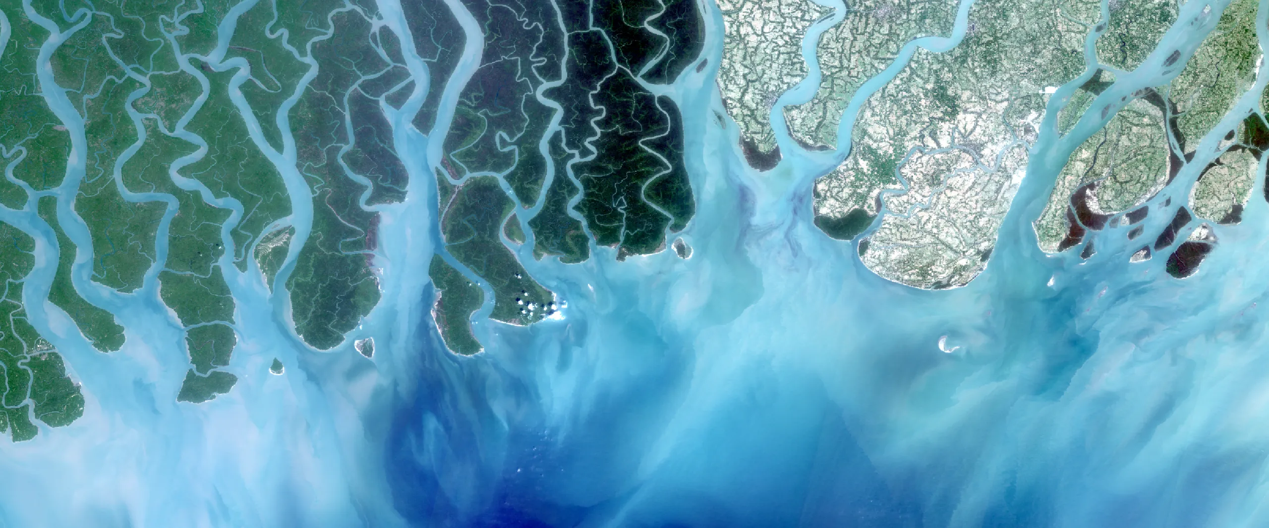 Visible satellite imagery showing costal habitat in South East Asia.