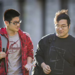 chinese students walking across campus
