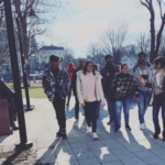students walking across campus