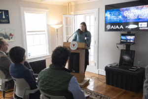 Clark Digital Project Librarian Catherine Stebbins during a press conference previewing the First Launch Centennial events