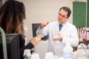 Faculty and student in a chemistry lab