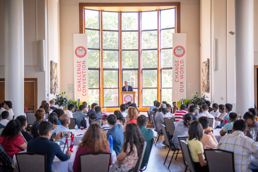 hall with people sitting around tables