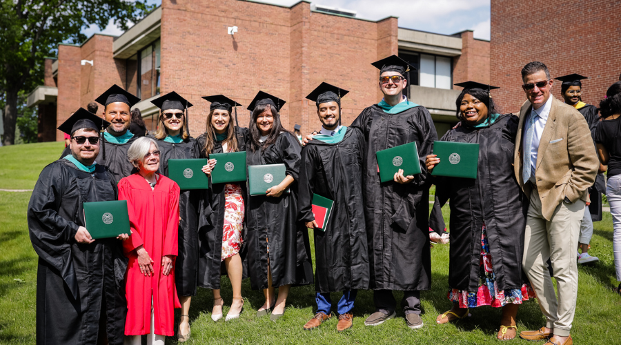 graduate students in graduation caps and gown