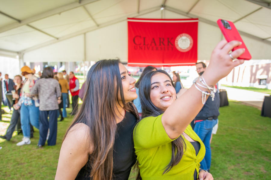 two graduate students taking selfies