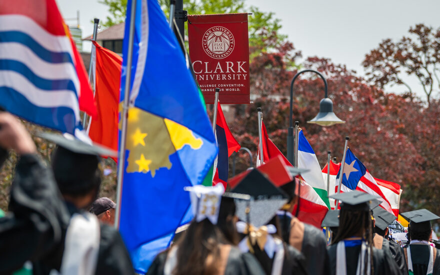 graduate students with international flags