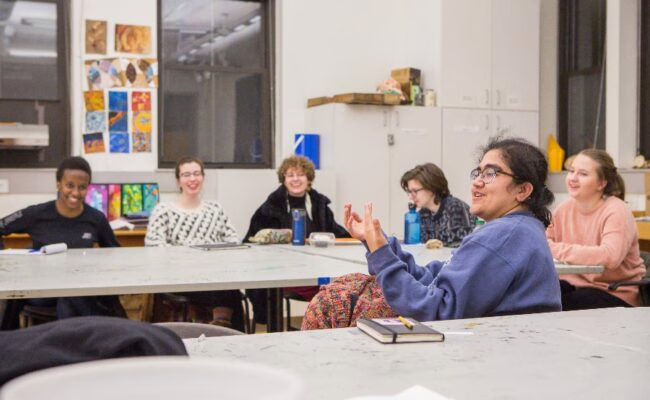 students sitting at tables