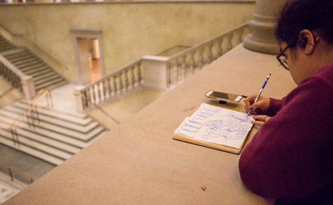 student drawing the Worcester Art Museum