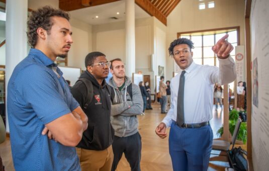 a student presents research during ClarkFest