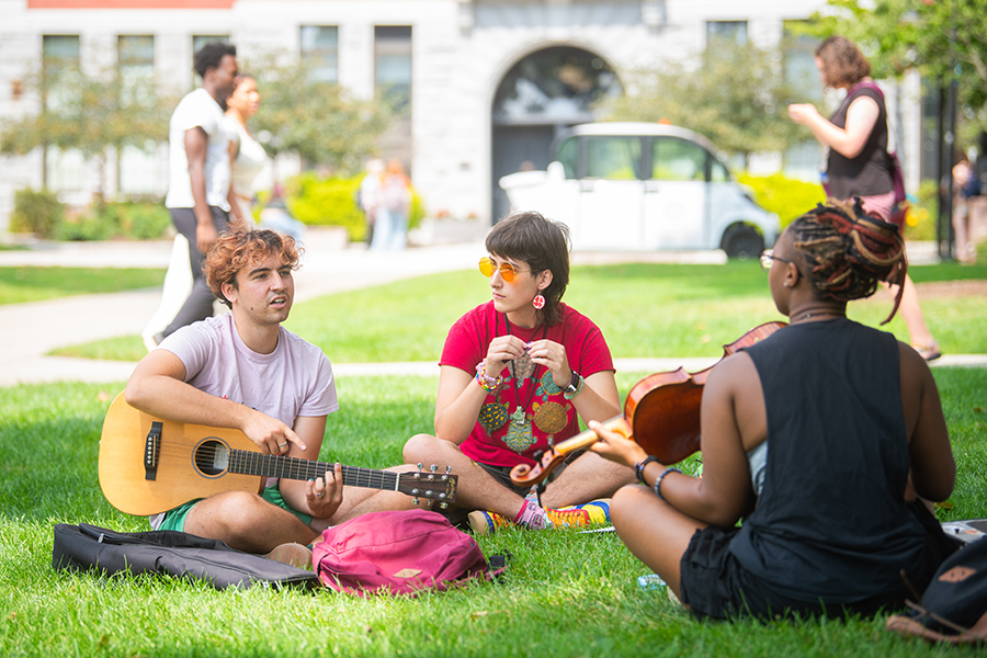 students on campus green