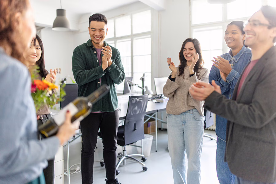 employee getting gifts for first year anniversary