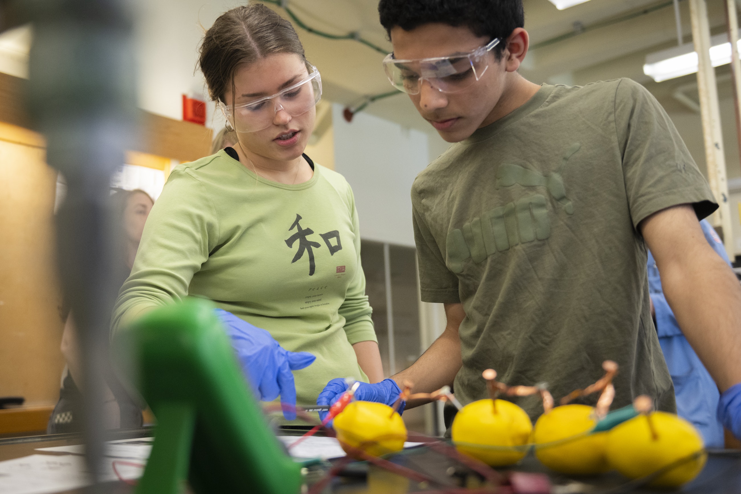 Worcester high school students conducting chemistry experiment at Clark