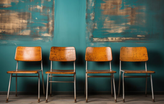 refugee certificate hero with empty chairs