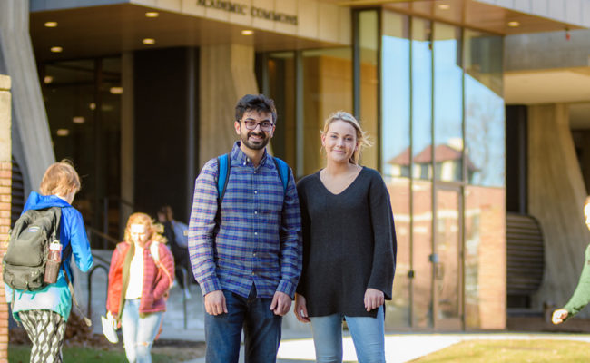 students in front of the librryy