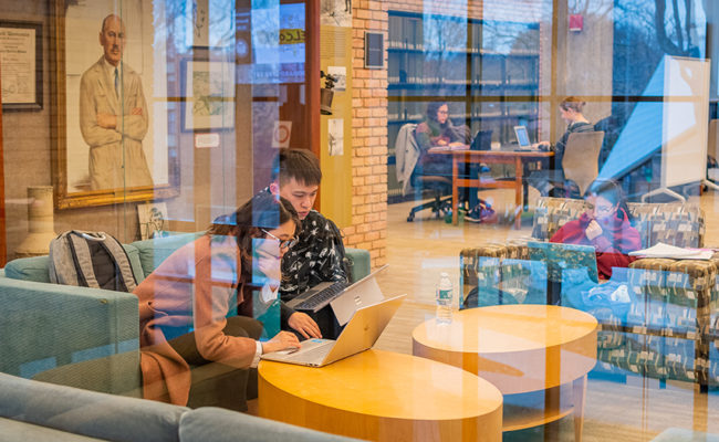 students in library